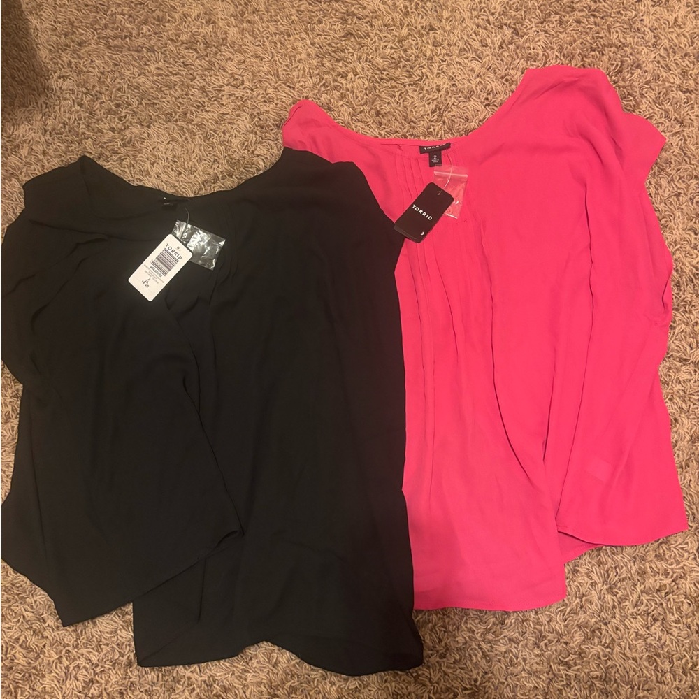 Set of 2 size 18(2x) tops from torrid. One pink one black, Brand NWT!